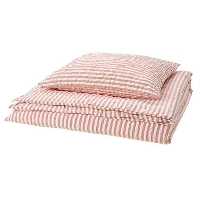Red and white striped bedding set with wave pattern.