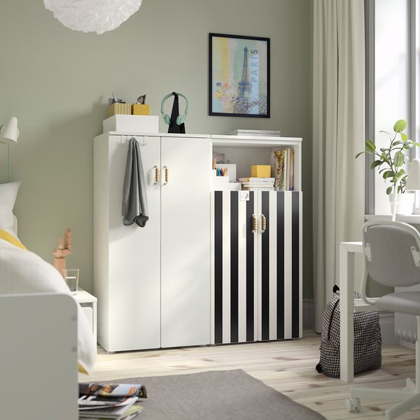 SMÅSTAD wardrobe with stripes, corner fit, items on top, hanging towels, open shelves, near bed.
