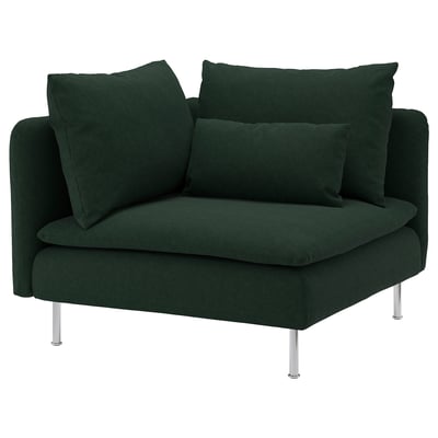 Green corner sofa, modern, deep cushions.