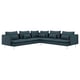 Modern l-shaped teal sectional sofa with loose cushions.
