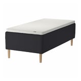 New STAVANGER bed in black with white mattress, square tufted design, wooden legs.