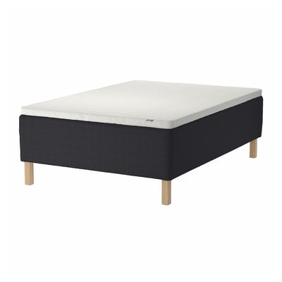 IKEA STAVANGER black bed base with white mattress, wooden legs.