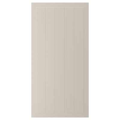 A beige STENSUND cabinet door with a framed, grooved panel design. The door has a smooth, lacquered surface.