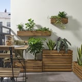 STJÄRNANIS wooden plant boxes on balcony, plants vary in size, acacia wood, rectangular shape, stacked vertically and horizontally.