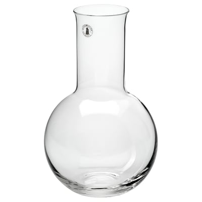 A clear glass carafe named STOCKHOLM 2025, hand-blown by artisans, suitable for decanting wine or serving water, showcasing scandinavian design.