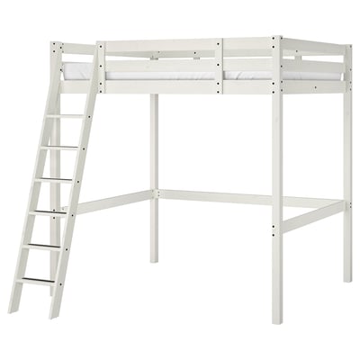 A white wooden STORÅ loft bed with a ladder on one side.