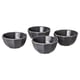 Four dark grey, faceted, stoneware ceramic bowls arranged in a square pattern.