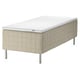 An IKEA STUVLAND beige mattress on a wooden base with metal legs.