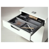 White desk drawer with SUMMERA organizer holding pens, paperclips, clips, and scissors.