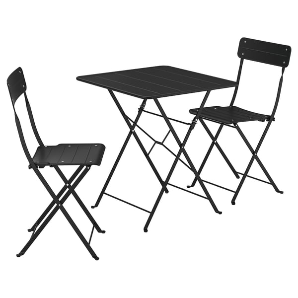 Black SUNDSÖ foldable outdoor table with 2 chairs, metal frames, slatted seats, ideal for small spaces.