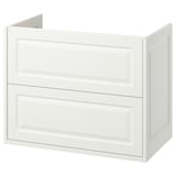 White TÄNNFORSEN bathroom cabinet with classic beveled details, featuring two drawers for storage.