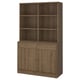 A dark wood TONSTAD storage unit with closed cabinets, open shelves, oak veneer, and soft-close mechanism.