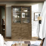 TONSTAD cabinet elegantly stores in oak, pine, glass, with a tall, window-flanked presence.