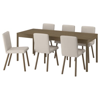 Modern dining set with wooden table and six beige chairs.
