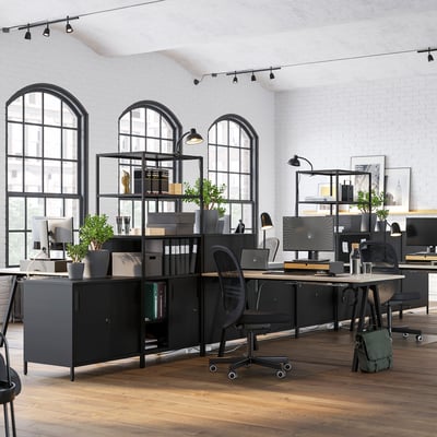 A TROTTEN desk in beige. Its rectangular with a-shaped black metal legs. The design is sturdy and functional for office work.