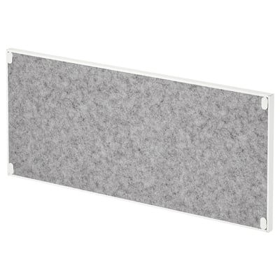 A TROTTEN notice board. Its gray, rectangular, with a white border. Its made of polyester and can be mounted to a desk or cabinet for organization.