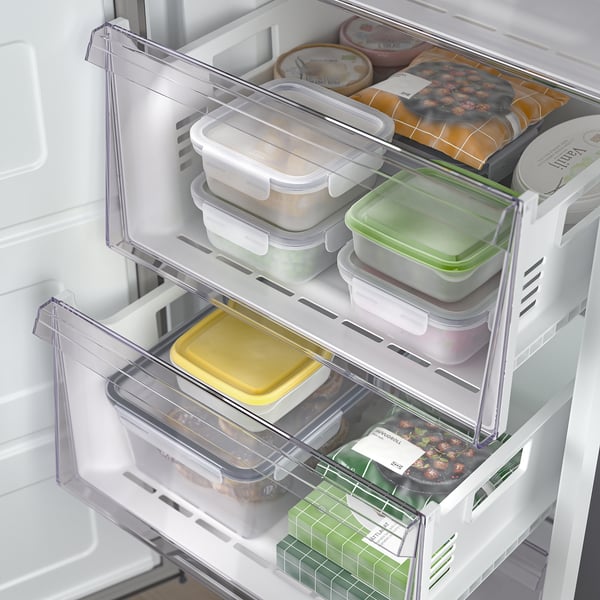 Fridge freezer with clear drawers and trays, showcasing organized food storage, quick freeze, and no frost functions.