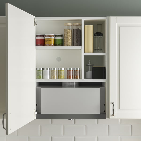 Kitchen cabinet with integrated extractor hood, featuring led light and multiple shelves for spice jars and kitchen items.