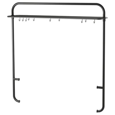 Black metal kitchen rack with hooks and shelf, minimalist design.