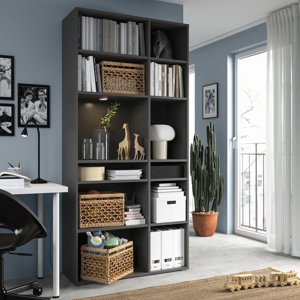 Home office with VIHALS bookcase, desk, chair, and large window.