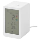 White VINDSTYRKA air monitor displays pm2. 5, temp, humidity, voc.