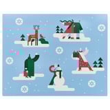 A winter-themed blue placemat deer, sleds, and a snowman in green, red, and white.