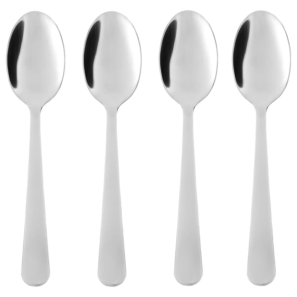 Neljä kiiltävää hopealusikkaa, klassinen muotoilu, ruostumattomasta teräksestä valmistettu materiaali, identtinen muoto, siististi järjestetty.