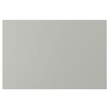 Vaaleanharmaa suorakaiteen muotoinen HAVSTORP-keittiökaapin ovi, jossa on sileä ja selkeä muotoilu.