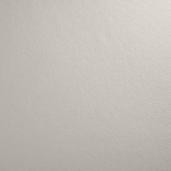 Sileä, vaalea, korkealaatuinen laminaattipinta, joka heijastaa puhtautta ja kestävyyttä.