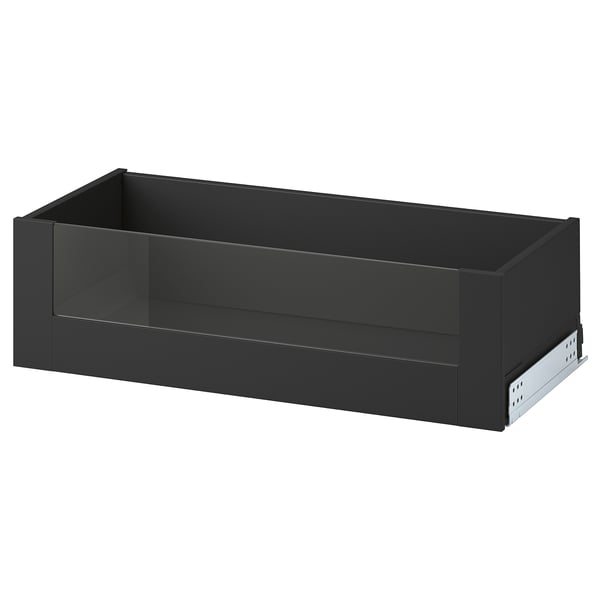 Ikea KNIVSHULT musta laatikko, moderni muotoilu, sileä pinta, metallikiskot, suorakaiteen muotoinen.