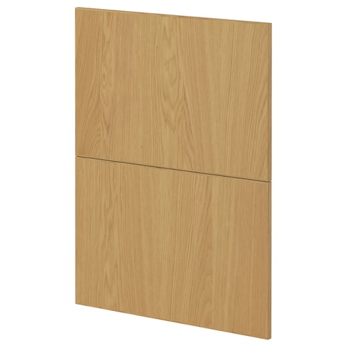 IKEA METOD -kaapin ovi vaalealla tammiviimeistelyllä. Se on suorakaiteen muotoinen, ja siinä on sileä, luonnollinen puun syyrakenne.