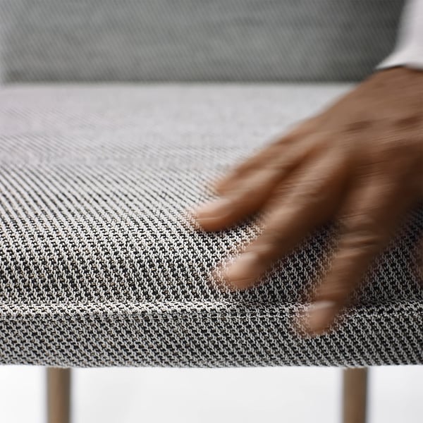 Käsin koskettava kankainen tuolinpäällinen, sileä ja kestävä.