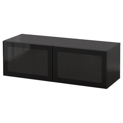 En svart BESTÅ-förvaring med eleganta glasdörrar, modern design och robust konstruktion.