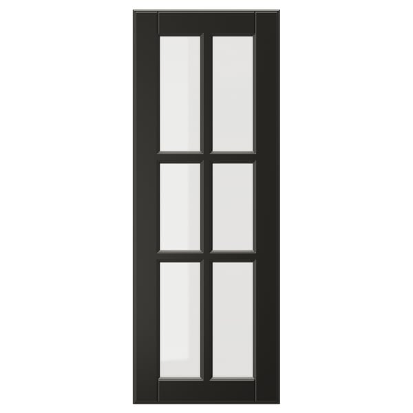 En BODBYN svart glasdörr med fasad ram och härdat glas, med en klassisk och sofistikerad design.
