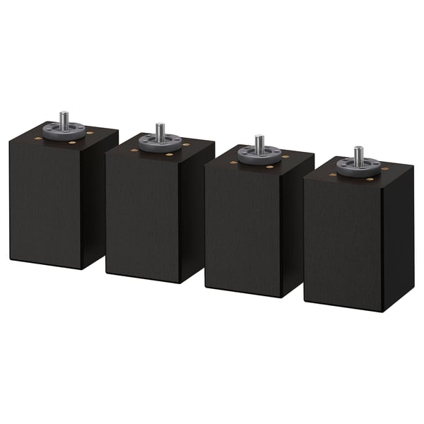 Fyra svarta möbelben i trä med justerbara fötter för stabilitet.