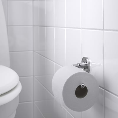 Toalettpappershållare i krom med vitt papper, serie BROFJÄRDEN.