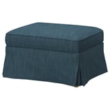 En blå EKTORP fotpall, rektangulär, med mjuk, veckad design. Tillverkad av bomull, polyester, viskos och linneblandning.
