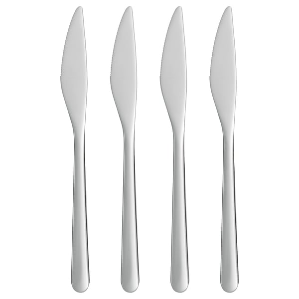 Fyra silverknivar i rostfritt stål, eleganta och moderna, prydligt placerade sida vid sida i rad. Minimalistisk design, perfekt för dukning.