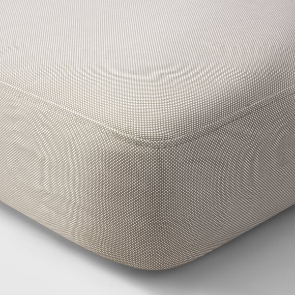 Högkvalitativt, slitstarkt kuddfodral för utomhusbruk i en neutral ton med subtilt mönster och dragkedja.