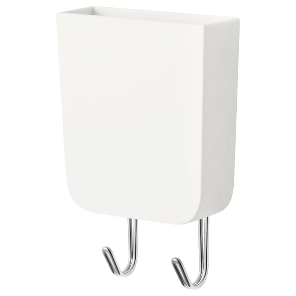 En vit HUNDKOJA magnetisk organisatör med krokar som används för att hålla små föremål och verktyg. Den har en rektangulär design med två metallkrokar.