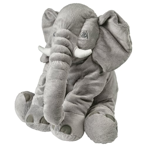 Elefant plyschleksak, grå, mjuk, stor, sittande, vänligt ansikte, fladdrande öron, vita betar.