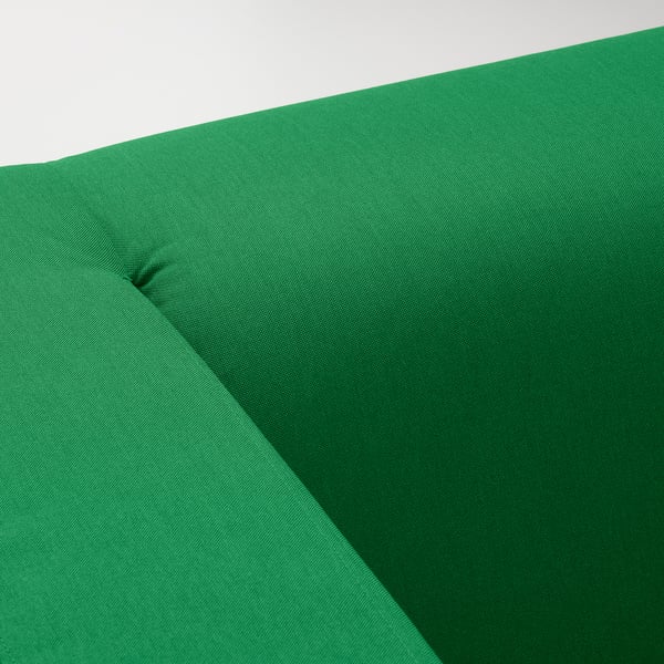 Livlig grön soffa, modern design, bekväma sittplatser, slitstarkt tyg, kvalitetsmaterial.