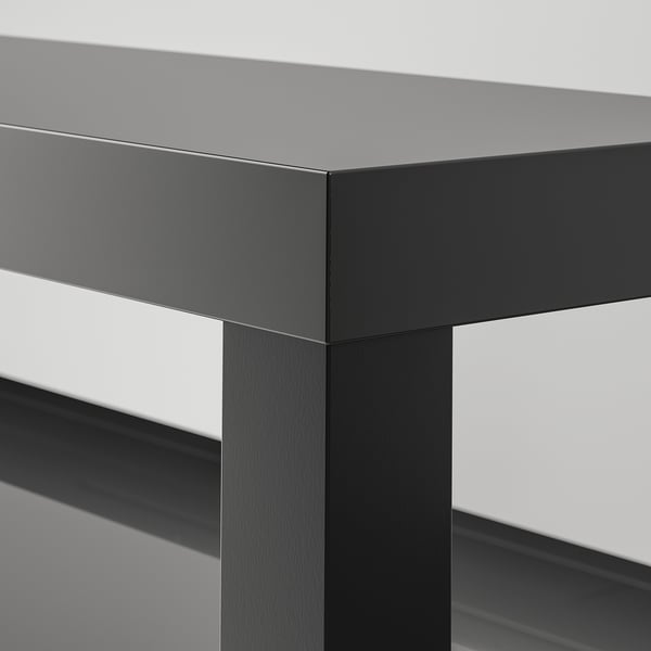 Modern, elegant tv-bänk i mörk finish; visar högkvalitativa material och ren design.