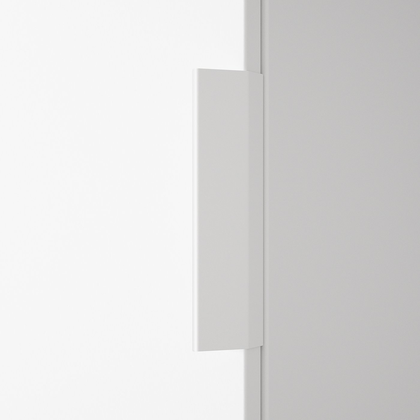 Ett minimalistiskt vitt handtag monterat på en slät vägg som visar upp modern design och kvalitetsmaterial.