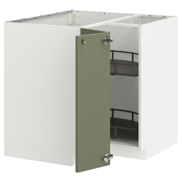 Ett vitt METOD-köksskåp med en grön dörr öppen som avslöjar justerbara hyllor.