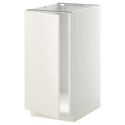 Ett vitt METOD köksskåp från ikea. Den är rektangulär med släta kanter och en modern design.