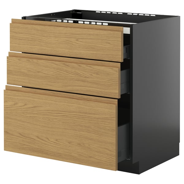 Modern köksmöbel med namnet METOD med voxtorp ljusa eklådor och mörkgrå botten. Tre lådor, elegant och minimalistisk design.