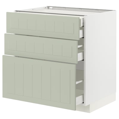 Modern köksmöbel: METOD med gröna stensundsfronter, tre lådor, vit stomme, robust design.