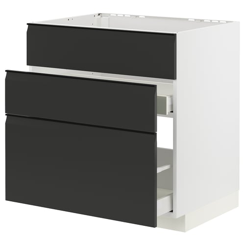Modernt svart och vitt ikea köksskåp med snygga lådor.