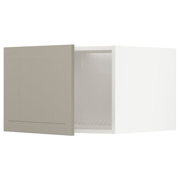 Ett beige METOD köksskåp med slät finish och paneldesign. Den har en elegant rektangulär form och är monterad på väggen.